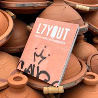 Cover of the street art book 'L7yout,' showcasing urban art from Marrakech, with vibrant designs and stories from the city's wal